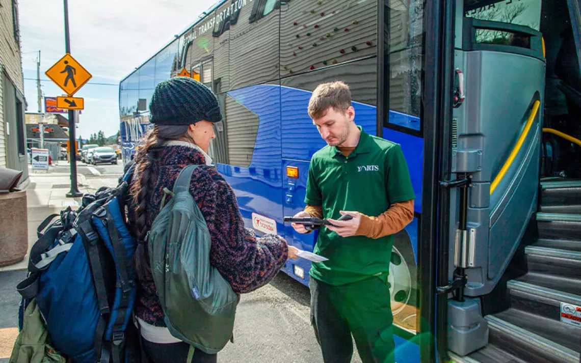 After stopping in Mariposa for breakfast, writer Carmen Kohlruss gets checked back onto a YARTS public transit bus before traveling into Yosemite National Park via the Highway 140 route.